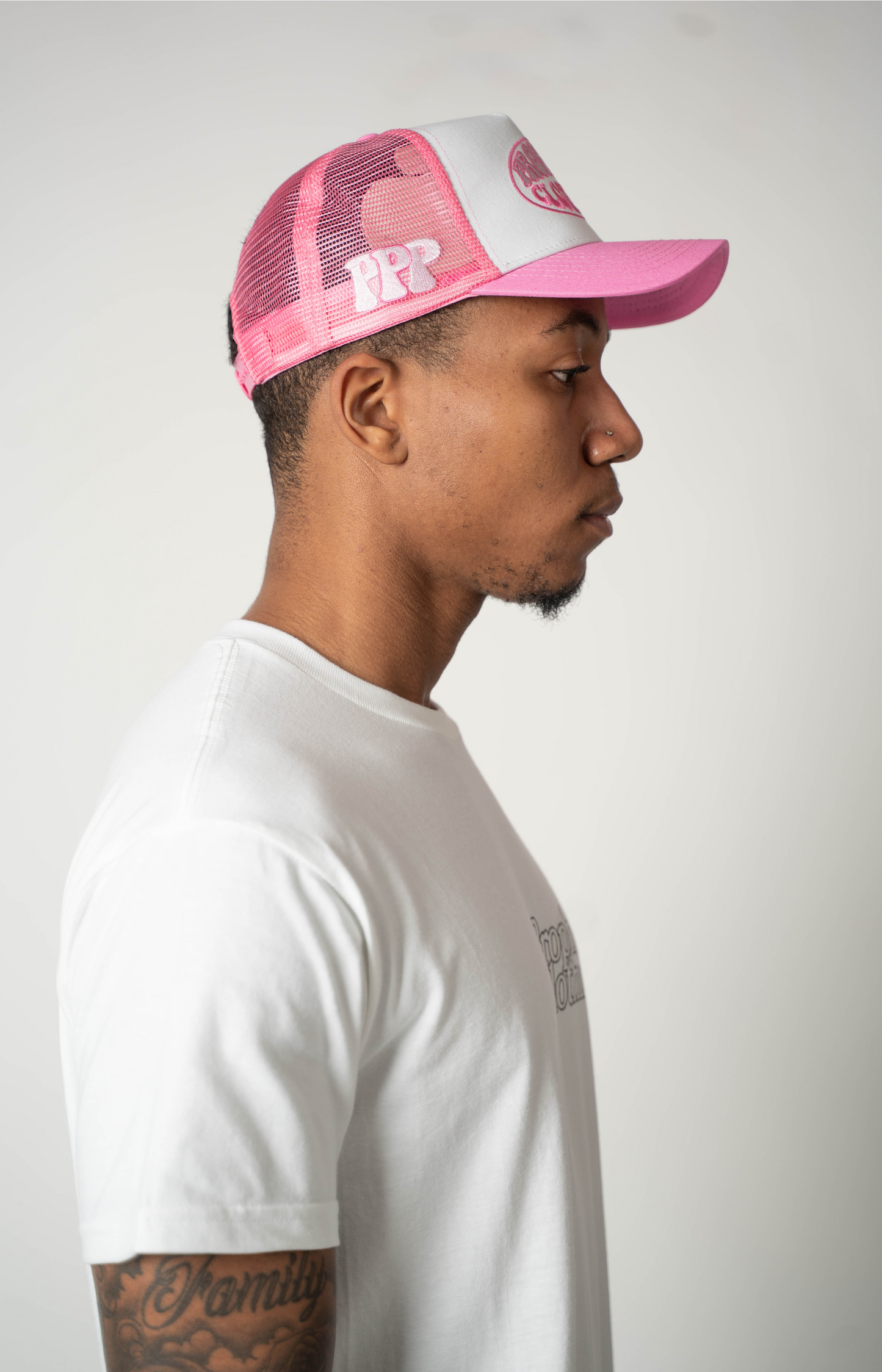 pink trucker hat